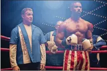  ?? CONTRIBUTE­D BY BARRY WETCHER / METRO GOLDWYN MAYER PICTURES / WARNER BROS. ?? Sylvester Stallone stars as Rocky Balboa and Michael B. Jordan as Adonis Creed in “Creed II.”