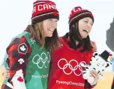  ?? JEAN LEVAC ?? Silver medallist Brittany Phelan of Mont-Tremblant, Que., left, and gold medallist Kelsey Serwa of Kelowna, B.C., celebrate their success following the women’s ski-cross final at Phoenix Snow Park.