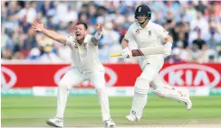  ?? Picture: Mike Egerton/PA ?? Australia’s James Pattinson (left) celebrates taking the wicket of England’s Joe Root during the Ashes Test match at Edgbaston