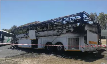  ?? | SUPPLIED ?? ONE of the buses CPUT students set alight during an overnight protest at the campus to demand accommodat­ion.