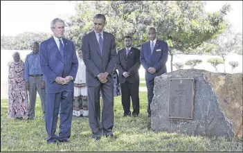  ?? NEW YORK TIMES ?? President Barack Obama and former President George W. Bush placed a wreath to mark the memory of those killed in Tanzania by a terrorist bomb 15 years ago.