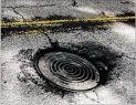  ?? COURTESY ?? Clay Edwards still hopes this manhole on West Wesley Road in the Buckhead area can be fixed.