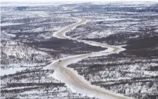  ?? THE CANADIAN PRESS FILES ?? A direct connection is being planned to link Nunavut to southern Canada highways, similar to this 120-km all-weather link near Inuvik, N.W.T. It would be Nunavut’s first such link.