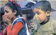  ?? [AP PHOTO] ?? This image released early Sunday by the Syrian Civil Defense White Helmets, shows a child receiving oxygen through a respirator following an alleged poison gas attack in the rebel-held town of Douma, near Damascus, Syria.