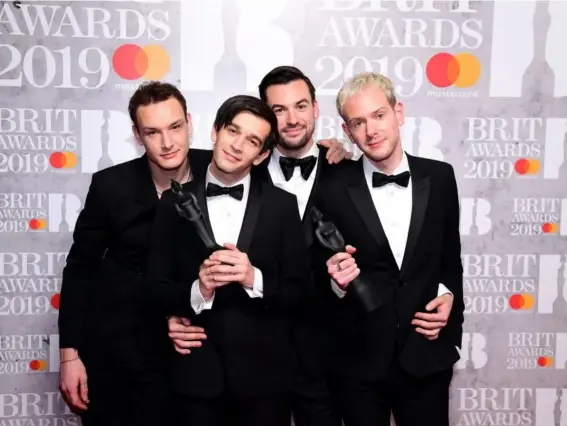  ?? (PA) ?? Matthew Healy, Ross MacDonald, George Daniel and Adam Hann of The 1975, who won the Best British Group award and Best British Album