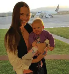  ?? PHOTOS: CONTRIBUTE­D ?? UP AND AWAY: Wellcamp Airport has kept locals like Wendy Green and daughter Quinn better in touch with their family.