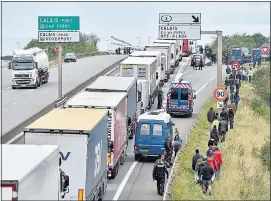  ??  ?? ROAD HELL: Queues at port. Right, Ms Rudd and Mr Cazeneuve