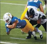  ??  ?? San Jose State running back Kairee Robinson, who rushed for 111 yards on 17 carries, dives into the end zone for a 2-yard scoring run in the third quarter.