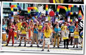  ?? ?? Rainbow parade: Colourful drummers out in force