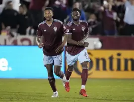  ?? David Zalubowski, The Associated Press ?? Rapids defender Lalas Abubakar, right, celebrates his secondhalf goal with Auston Trusty.