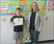  ?? SUBMITTED PHOTO ?? Trombone player Evan Schiele with Dawn Krown, band instrument teacher.