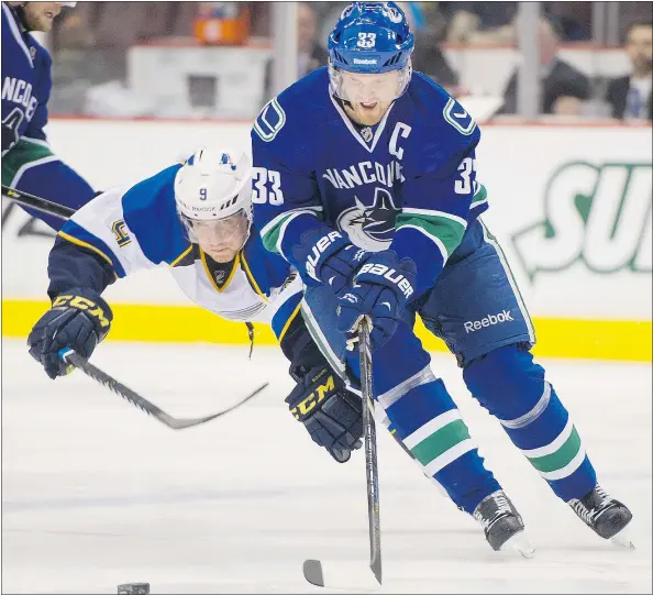  ?? GERRY KAHRMANN/PNG FILES ?? Captain Henrik Sedin, shown outskating St. Louis Blues defender Jaden Schwartz, says the Canucks haven’t been as aggressive as they should have been against teams coming into Vancouver that have played in Alberta the previous night.