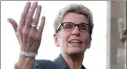  ?? SEAN KILPATRICK, THE CANADIAN PRESS ?? Ontario Premier Kathleen Wynne says it would “make a lot of sense” for the government-run liquor stores to sell marijuana if the federal Liberals make good on their promise to legalize pot.