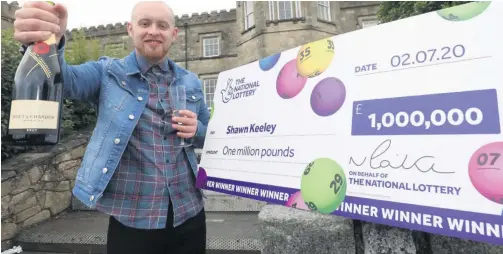  ??  ?? Shawn Keeley (26) from Dungiven celebrates becoming Northern Ireland’s latest National Lottery millionair­e after winning the jackpot on a scratchcar­d