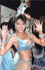  ?? DAVE CAULKIN, AP ?? There she is... Halle Berry, Miss USA contestant, is shown in costume at a Variety Club of Great Britain luncheon at the Hilton Hotel in London, on Nov. 7, 1986. The 20-year-old student from Cleveland placed first runner-up in the pageant.