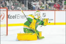  ?? Abbie Parr The Associated Press ?? Minnesota Wild goaltender Marc-andre Fleury has 561 career wins on the ice, and at least one victory in prank wars.