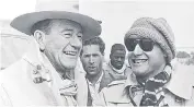  ??  ?? Iconic: Jack Cardiff with John Wayne and, right, Katherine Hepburn with Humphrey Bogart in the African Queen. Above, David Niven and Kim Hunter in A Matter of Life and Death