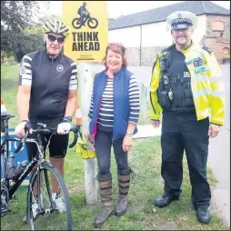  ??  ?? Pictured, at the launch of the Think Ahead road safety campaign launch in Woodhouse, are, left to right: Peter Moss, president of the Ratae Road Club, local horse rider, Liz Randall, Charnwood Road Safety Committee, and PC Shaun Gent of the Leicesters­hire Police Safer Roads Team.