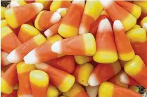  ?? JULIA RUBIN / AP ?? Cruel joke for trick-or-treaters or coveted seasonal delight? The great Halloween debate over candy corn is on.