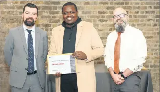  ?? (Pic: Alice PR) ?? Tapiwa Divine Chipatiko, Mallow, a graduate of the Migrant-Councillor Internship Scheme, pictured with Brian Killoran, CEO of the Immigrant Council of Ireland and Minister of State at the Department of Rural and Community Developmen­t, Joe O’Brien TD.