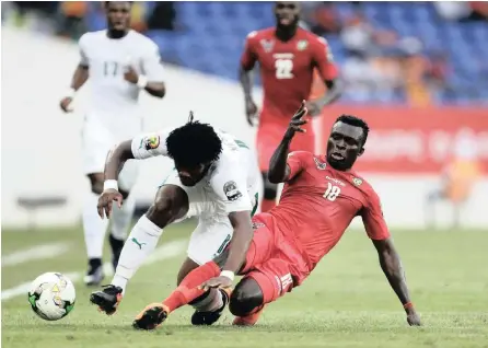  ??  ?? STALEMATE: Ivory Coast’s Franck Yannick Kessie, left, is challenged by Togo’s Atakora Lalawewe during the Africa Cup of Nations Group C match between Ivory Coast and Togo at the Stade de Oyem in Gabon on Monday. The teams drew 0-0. PICTURE: AP