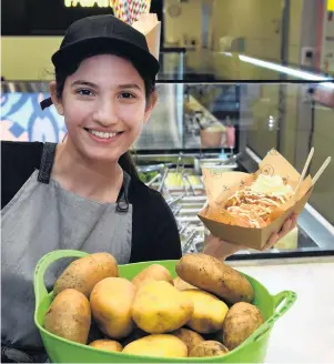  ?? PHOTO: STEPHEN JAQUIERY ?? A Kiwi staple . . . Aysu Shahin from Patate in her recently opened potato shop.