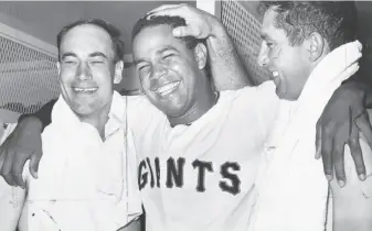  ?? Gordon Peters / The Chronicle 1963 ?? Giants pitcher Juan Marichal, above, celebrates a 1963 no-hitter with teammates Chuck Hiller and Jimmy Davenport. Bartolo Colon, below, recently got his 244th win, one more than Marichal’s total, to become the winningest pitcher from the Dominican...