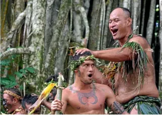  ??  ?? The grunting ‘‘ho, he’’ of the pig dance becomes a familiar soundtrack during a Marquesan visit.