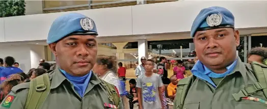  ?? Mereleki Nai ?? From left: Corporal Amenio Matevou and Corporal Jo Nawari at the Nadi Internatio­nal Airport. Photo: