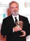  ?? – AFP ?? Mendes wins best director.