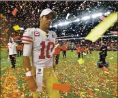  ?? JOSE CARLOS FAJARDO — STAFF ARCHIVES ?? San Francisco 49ers quarterbac­k Jimmy Garoppolo walks off the field after being defeated by the Kansas City Chiefs in Super Bowl LIV at Hard Rock Stadium in Miami Gardens, Fla., on Feb. 2, 2020.