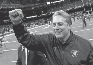  ?? DERICK E. HINGLE, USA TODAY SPORTS ?? Raiders coach Jack Del Rio leaves the field triumphant after his two- point gamble paid off.