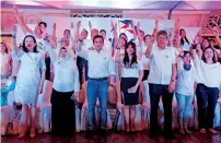 ?? AFP ?? Philippine Senators Risa Hontiveros, Antonio Trillanes, Francis Pangilinan and others raising a three-finger salute, as they launched the Tindig Pilipinas movement in Manila. —