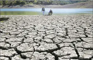  ?? Marcio Jose Sanchez Associated Press ?? NO RAIN FELL in Southern California in October, and almost one-fifth of the state is either abnormally dry or in moderate drought. Above, the dry bed of Stevens Creek Reservoir in Cupertino in March 2014.