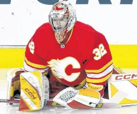  ?? POSTMEDIA NEWS ?? Calgary Flames goaltender Dustin Wolf during warmup before taking on the Arizona Coyotes in NHL action at the Scotiabank Saddledome in Calgary on Jan. 16.