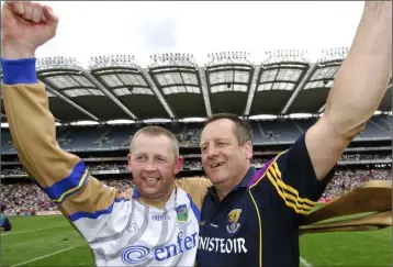  ??  ?? John Meyler celebratin­g with Damien Fitzhenry after the dismissal of Tipperary in the 2007 quarter-final.