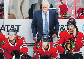  ?? KAMIL KRZACZYNSK­I /THE ASSOCIATED PRESS ?? If Edmonton continues to wallow, it wouldn’t be a shock if former Chicago Blackhawks coach Joel Quennevill­e is summoned to replace Todd Mclellan behind the Oilers’ bench.