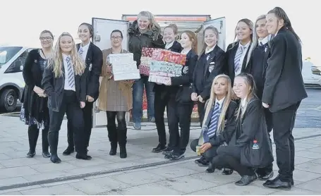  ??  ?? Pupils and staff at Seaham High School taking part in a shoe-box appeal.