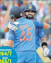  ?? AP/PTI ?? Virat Kohli and Rohit Sharma celebrate India’s semifinal win against Bangladesh in the Champions Trophy on Thursday.