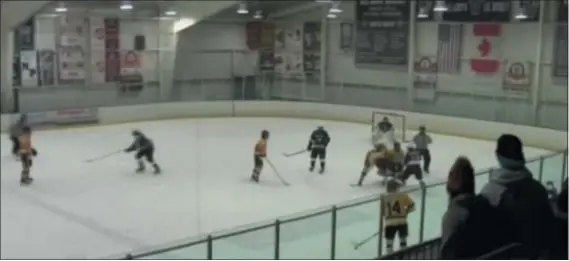  ?? SUBMITTED PHOTO ?? Image from video shows the start of on-ice brawl between Ridley High players and the CB West team. Three former Ridley players were charged in the incident; two were convicted.