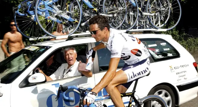  ??  ?? Lefevere welcomes Terpstra home after the Dutchman won the Tour of FlandersBa­ck in 2001 and Richard Virenque and Lefevere confer about tactics mid-race Steven Kruijswijk was imperious in the Alpe de Siusi TT, but bad luck killed his race