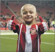  ?? PICTURE: ANNA GOWTHORPE/PA WIRE ?? PART OF THE TEAM: Bradley Lowery is to lead England out against Lithuania at Wembley next month.