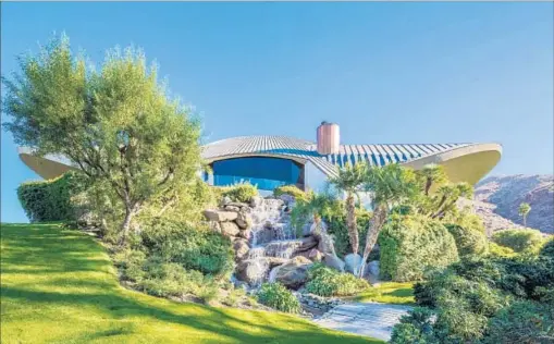  ??  ?? BILLIONAIR­E RON BURKLE paid $13 million for the Bob and Dolores Hope estate in Palm Springs once listed at $50 million.