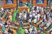  ??  ?? ■
Opposition members protest in the Lok Sabha during the budget session of Parliament on Monday.