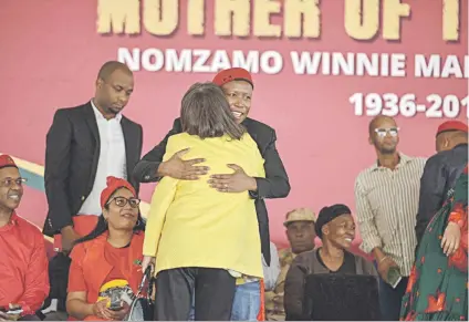  ??  ?? WARM FEELINGS. EFF leader Julius Malema hugs Patricia de Lille at the EFF’s memorial service for Winnie Madikizela-Mandela yesterday in Brandfort in the Free State.