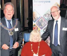  ??  ?? Pictured, from left to right, are David Hagger, The Provincial Grand Master of Leicesters­hire and Rutland, Mary Smith, of the Disabled Adventure Club and David Highton from Beacon Lodge of Freemasons.