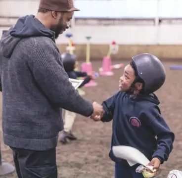  ??  ?? ‘There is a massive need for this,’ Freedom Zampaladus (left) says of the Urban Equestrian Academy he founded. ‘It would be great to have our programme all over the country’