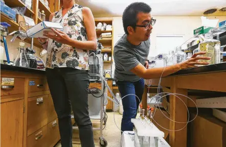  ?? Mark Mulligan / Staff photograph­er ?? Researcher­s have been sharing space in labs as they wait to move into newly completed lab space at the University of Texas Marine Science Institute in Port Aransas. The campus was devastated by Hurricane Harvey last year.