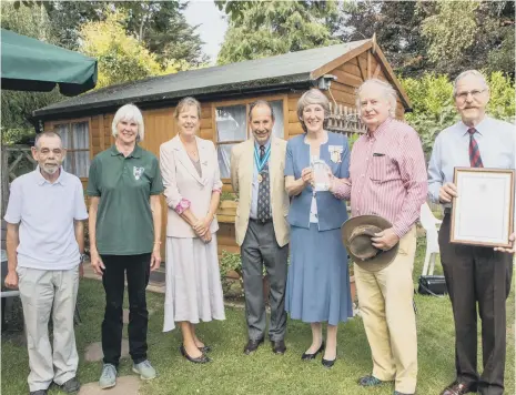  ?? ?? The Queen’s Award for Voluntary Service presentati­on to Henfield Haven