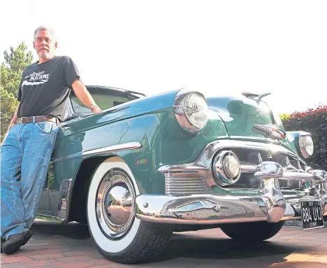  ??  ?? A DUNDEE car enthusiast is appealing for help to find a hub cap missing from his classic car.
Pete Sinclair, 63, was driving his 1953 Chevrolet Bel Air when he heard what he now thinks may have been the piece becoming detached, but as he did not...